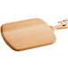 A Boska beech wood pizza peel/serving board with a handle.