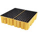 A yellow plastic Eagle Manufacturing drum pallet with black squares.