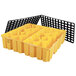 A yellow plastic Eagle Manufacturing drum pallet with black grids.
