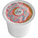 A white container of Ellis Donut Shop Blend Coffee Single Serve cups with a pink and blue logo.