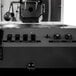 A Quick Ship Primo RAVEN-Xr15 coffee roaster machine in black matte.