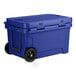 A navy blue CaterGator outdoor cooler with wheels.