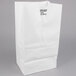 A white Duro paper bag with black text.
