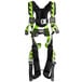 A green and black Honeywell Miller AirCore full-body harness.