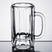 A Libbey clear glass mug with a handle.