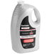 A white bottle of Sanitaire hard floor cleaner with 1 gallon/128 oz. of cleaner inside.