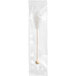 A clear plastic bag with white Dryden and Palmer rock candy barista stirrers inside.