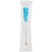 A Roses Dryden and Palmer blue raspberry rock candy swizzle stick in a clear plastic bag.