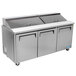 A stainless steel Turbo Air 3 door refrigerated sandwich prep table.
