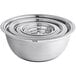 A stack of silver Choice stainless steel mixing bowls with silicone bottoms.