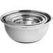 A group of three stainless steel Choice mixing bowls.