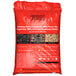 A red Royal Oak bag of charcoal wood pellets with text and images on it.
