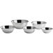 A set of five stainless steel Choice standard mixing bowls.