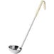 A stainless steel ladle with an ivory coated handle.