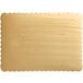 A gold laminated corrugated sheet cake board with a scalloped edge.