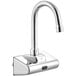 A silver Waterloo wall mount hands-free sensor faucet with a chrome gooseneck spout and a chrome button.