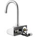 A Waterloo hands-free sensor faucet with a gooseneck spout and chrome, black, and gold handles.