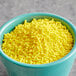 A bowl of Bake-Stable Yellow Sprinkles.