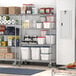 Steelton metal wire shelving kit in a kitchen with food items on white shelves.