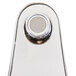 A close-up of an Equip by T&amp;S chrome single lever faucet with a small button.
