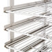 A Town rack for Town smokehouses with metal bars and a shelf.