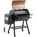 A black and brown Backyard Pro wood-fire pellet grill and smoker with the lid open.