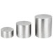 A Tablecraft stainless steel nesting riser set with three silver cylinders.