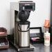 A Bunn pourover coffee maker on a counter.