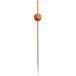 A Front of the House bamboo toothpick with a ball on the end.