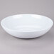 A white GET Siciliano bowl on a gray background.