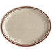 An Acopa narrow rim stoneware platter with brown speckles and a brown border.