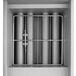 A stainless steel metal box with several tubes inside.