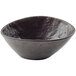 A black melamine bowl with a brown speckled rim and textured surface.