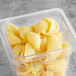 A plastic container filled with Barilla jumbo pasta shells.
