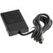 A black Carnival King foot pedal with a cable.