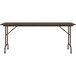 A brown Correll rectangular folding table with metal legs.