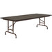 A Correll rectangular folding table with a brown top and metal frame.