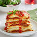 A plate with a stack of Barilla Oven Ready lasagna noodles.