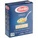 A blue box of Barilla Orzo pasta with a white label.