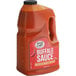 A jug of Sauce Craft Buffalo Sauce with a label.