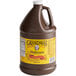 A brown jug of Grandma's Unsulfured Molasses with a yellow label.