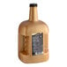 A brown plastic bottle of DaVinci Gourmet White Chocolate Flavoring Sauce with a black label.