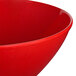 A close up of a red GET Red Sensation round catering bowl.