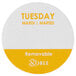 A round white label with yellow text reading "Tuesday" and the Noble Products logo.