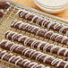 Alpine white chocolate coating on chocolate covered pretzels.