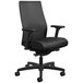 A black HON Ignition 2.0 office chair with arms and wheels.