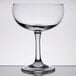 An Anchor Hocking margarita glass with a stem on a table.