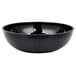 A black Cambro round ribbed bowl.