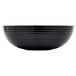 A close up of a black Cambro round ribbed bowl.