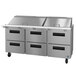 A Hoshizaki stainless steel food prep table with six drawers.